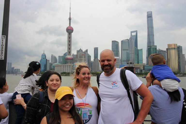 Highline students and faculty visit the Bund, with the modern Pudong skyline visible across the river.